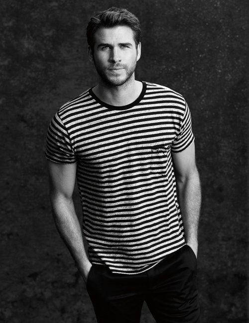 T-shirt by Saint Laurent, trousers by Givenchy